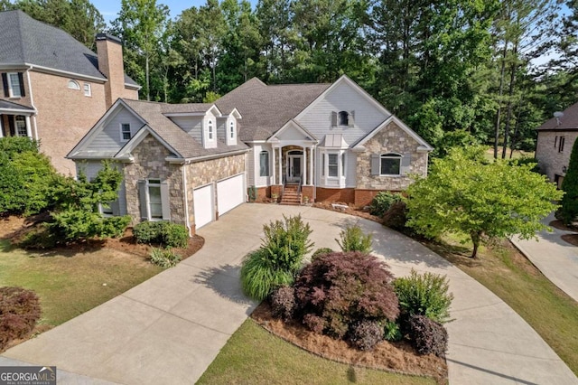 view of front of property with a garage