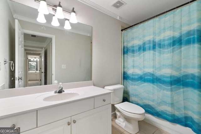 bathroom featuring tile patterned flooring, toilet, vanity, and ornamental molding