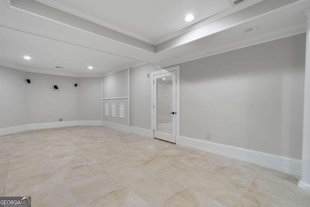 basement featuring ornamental molding and light tile patterned floors