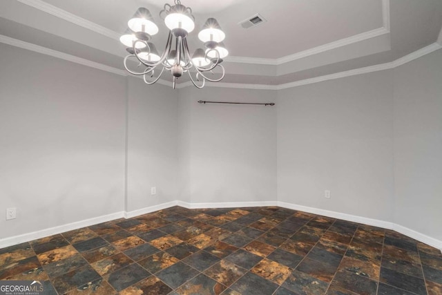 tiled empty room featuring a tray ceiling, crown molding, and a chandelier