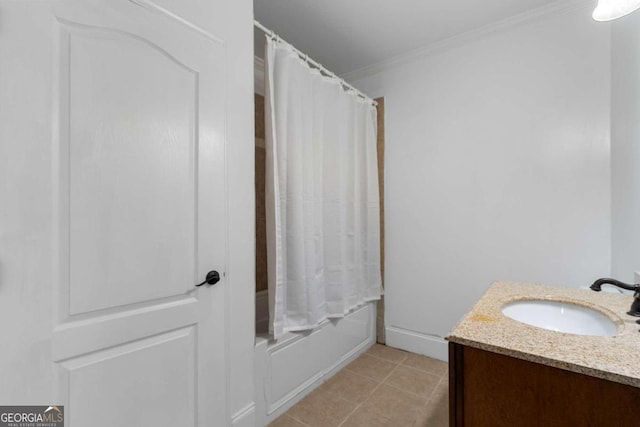 bathroom with tile patterned floors, shower / bath combo, vanity, and ornamental molding