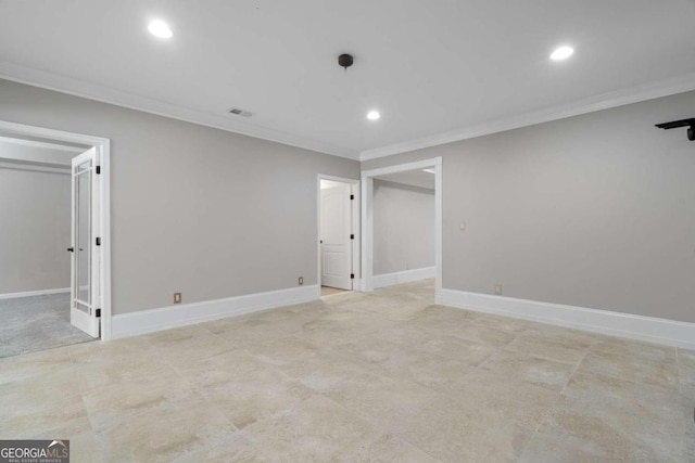 basement featuring light tile patterned flooring and ornamental molding