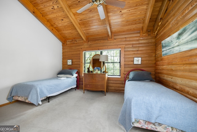 bedroom with carpet, ceiling fan, beam ceiling, and wooden ceiling