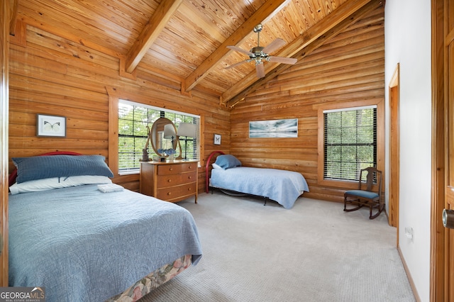 carpeted bedroom featuring high vaulted ceiling, multiple windows, and ceiling fan