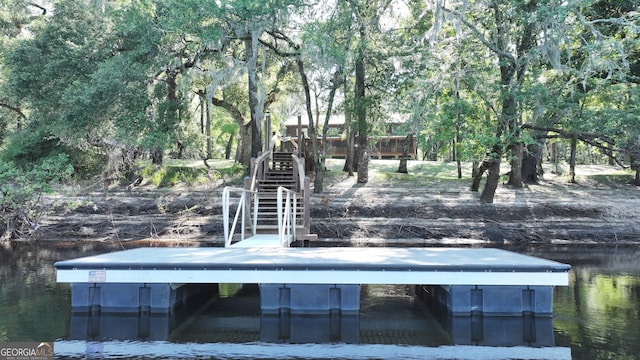 view of dock with a water view