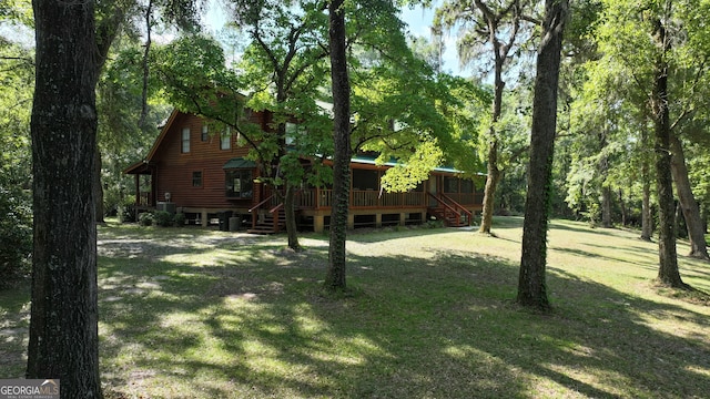 view of yard with a deck