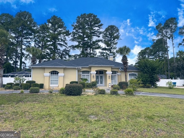 view of front of home with a front lawn