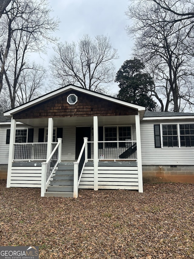 115 Montgomery St, Atlanta, GA 30317 - view of front facade featuring a porch