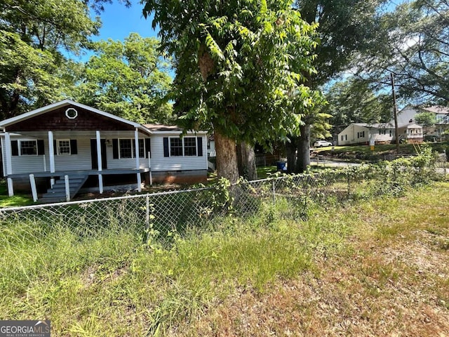 view of front of property featuring covered porch