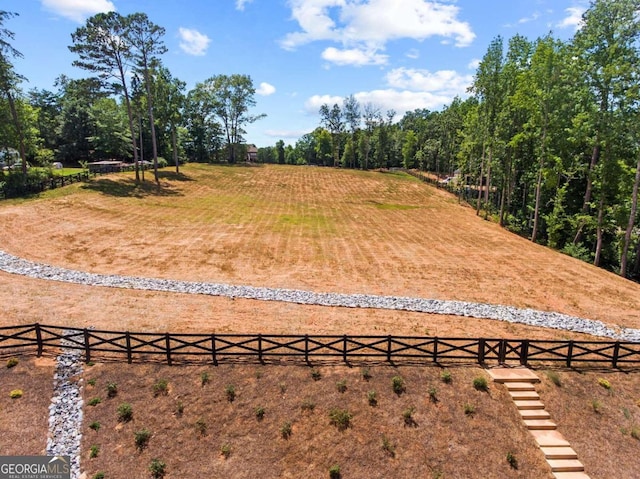 exterior space with a rural view