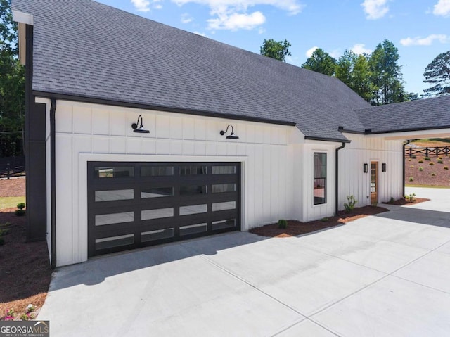 modern inspired farmhouse featuring a garage