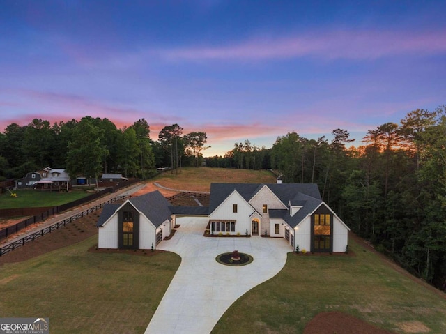 view of front of house with a lawn