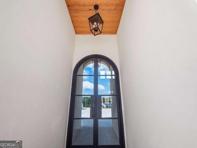 interior space with wood ceiling