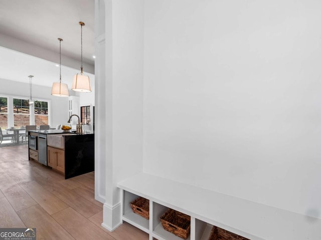 mudroom featuring light wood-type flooring