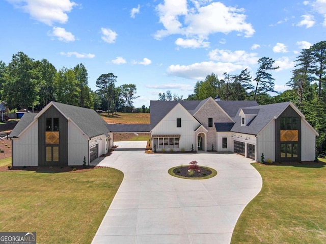 modern farmhouse with a front yard