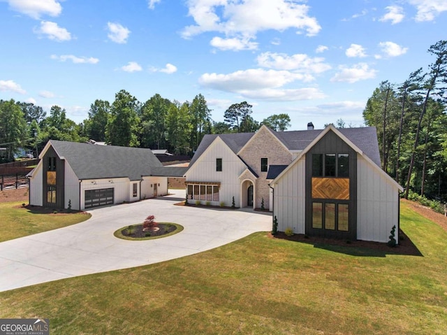 modern inspired farmhouse with a front yard