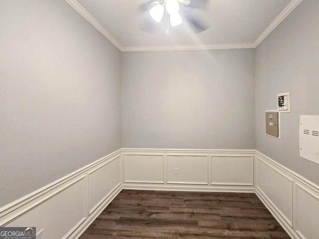 unfurnished room with ceiling fan, dark hardwood / wood-style flooring, and crown molding