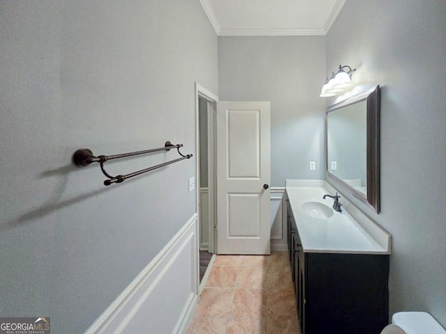 bathroom featuring vanity, tile patterned floors, and ornamental molding