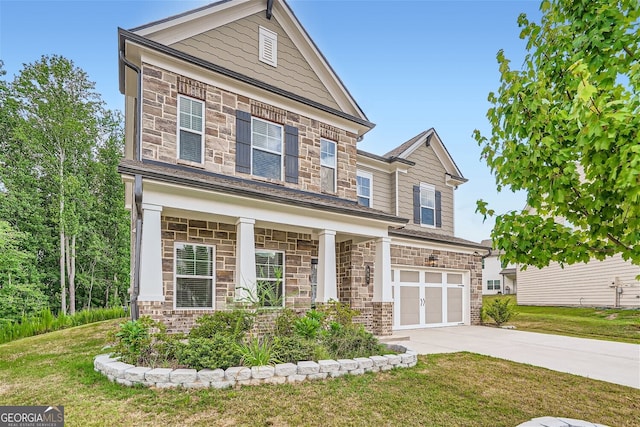 craftsman-style home featuring a garage and a front lawn