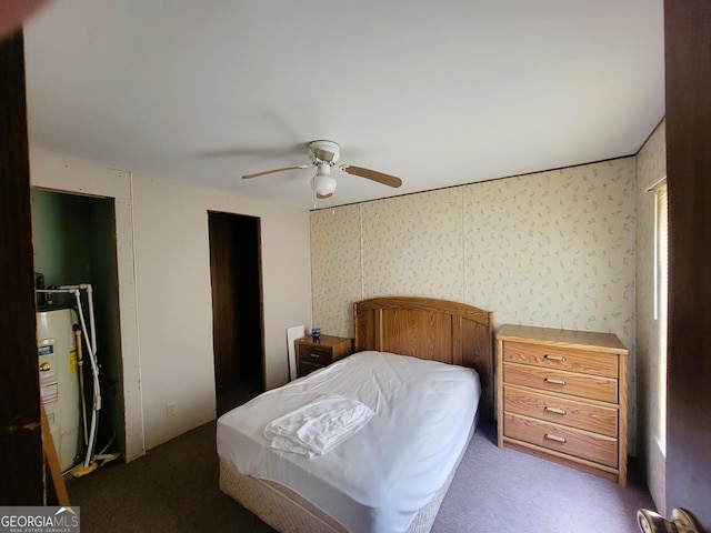 bedroom featuring water heater and ceiling fan