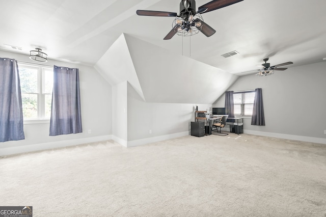 bonus room with vaulted ceiling, carpet floors, and ceiling fan