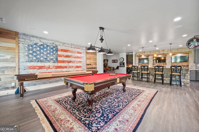 game room with indoor bar, hardwood / wood-style flooring, and billiards