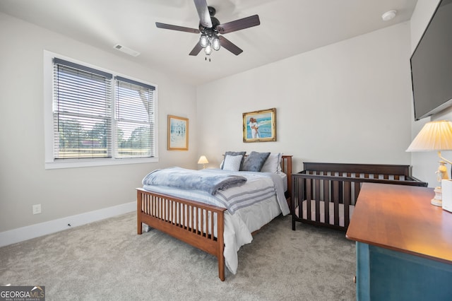 bedroom featuring carpet floors and ceiling fan