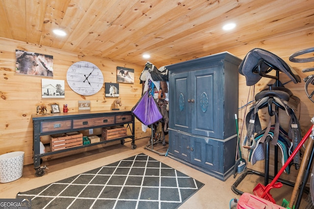 interior space with wooden walls and wood ceiling