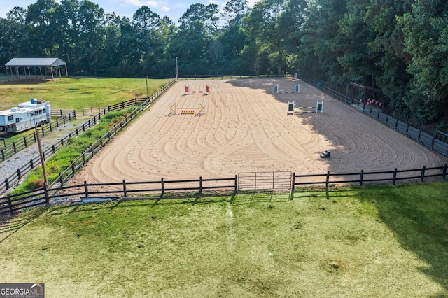 birds eye view of property featuring a rural view