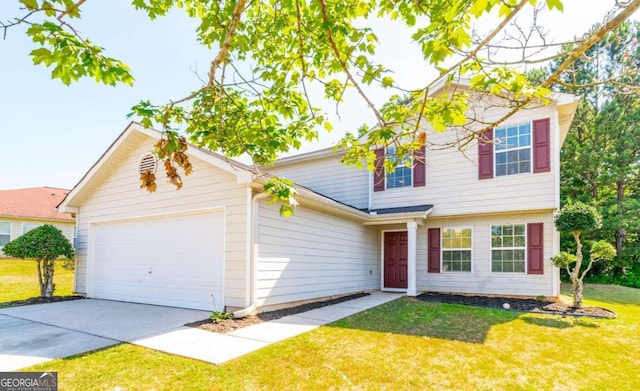 view of front of property featuring a front lawn and a garage