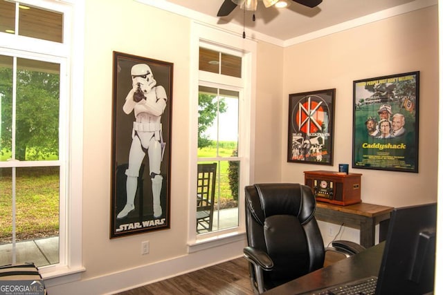 home office with baseboards, dark wood-style flooring, a ceiling fan, and crown molding