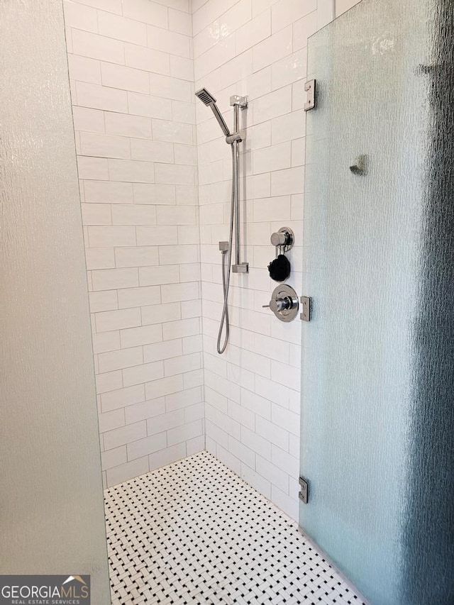 bathroom featuring a shower stall