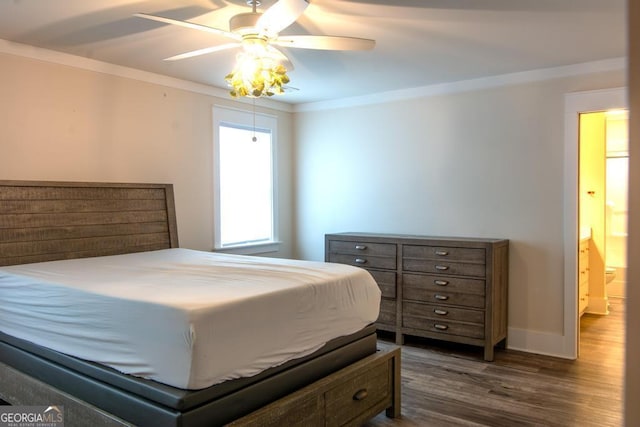 bedroom featuring ceiling fan, ornamental molding, dark wood finished floors, and baseboards