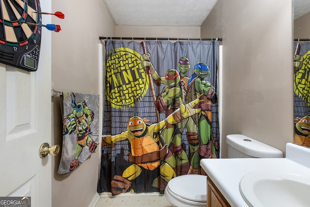 bathroom with toilet, a textured ceiling, vanity, and a shower with curtain