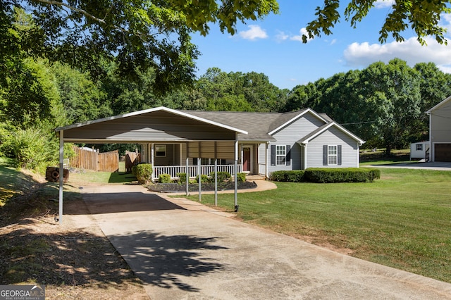 single story home featuring a carport and a front yard