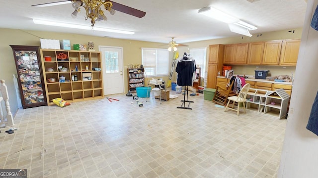 5110 Macland Rd, Powder Springs, GA 30127 - miscellaneous room featuring ceiling fan, plenty of natural light, and light flooring