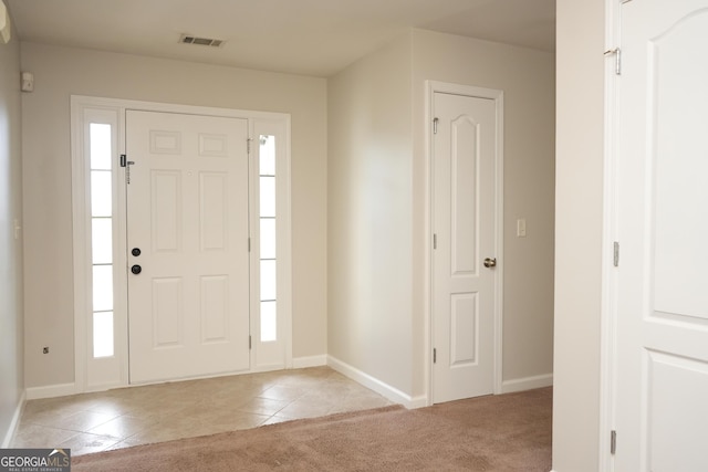 view of carpeted entryway