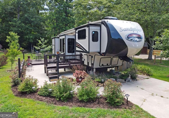 exterior space with a wooden deck