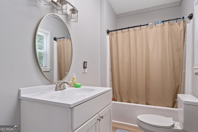 full bathroom with toilet, vanity, and shower / bath combination with curtain