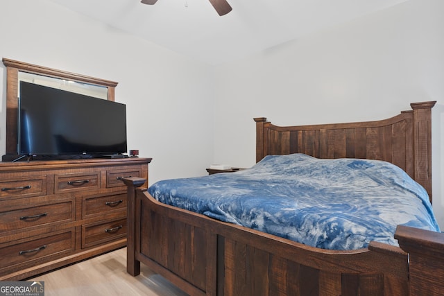 bedroom with ceiling fan and light hardwood / wood-style flooring