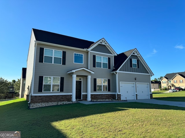 craftsman-style house with a garage and a front yard