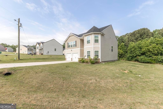 view of front facade with a garage and a front lawn