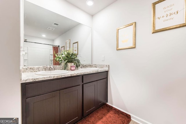 bathroom with double sink vanity