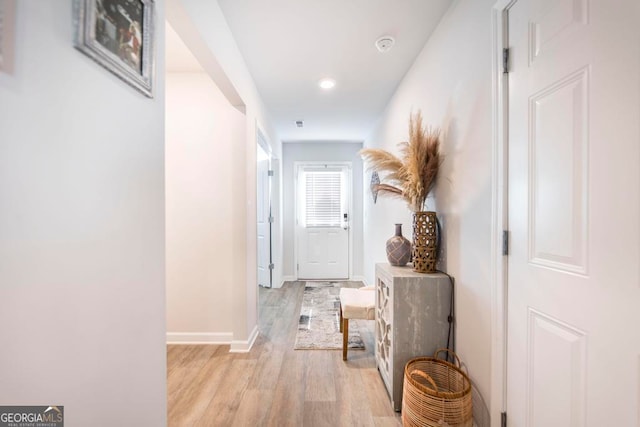 hallway featuring light hardwood / wood-style floors