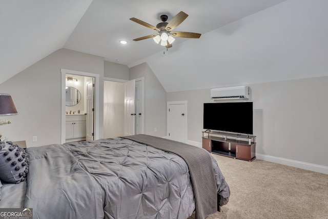 bedroom featuring lofted ceiling, ceiling fan, connected bathroom, a wall mounted AC, and light colored carpet