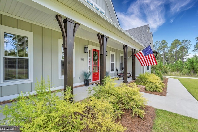 property entrance with covered porch