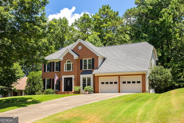 colonial house with brick siding, a shingled roof, a front lawn, concrete driveway, and a garage