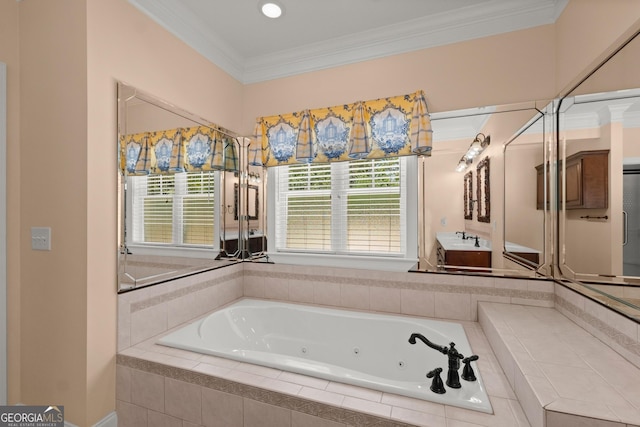 bathroom with crown molding and a relaxing tiled tub