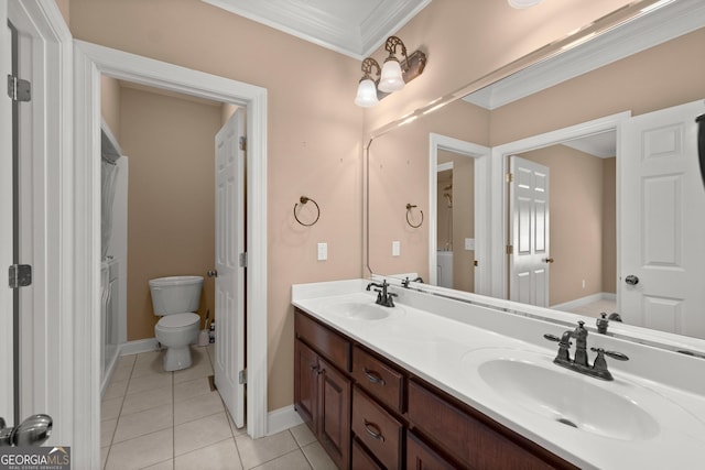 bathroom featuring tile patterned flooring, vanity, toilet, and ornamental molding