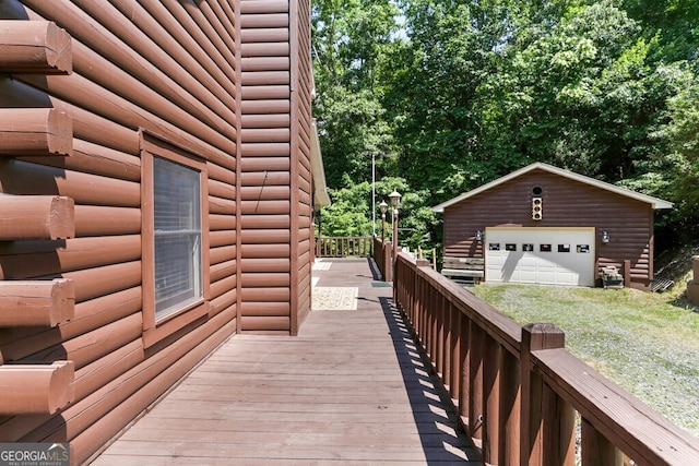 exterior space with a garage and an outdoor structure